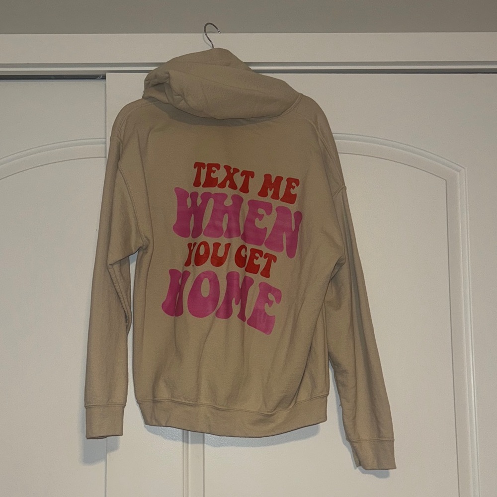 Tan Hoodie with Pink and Red Text